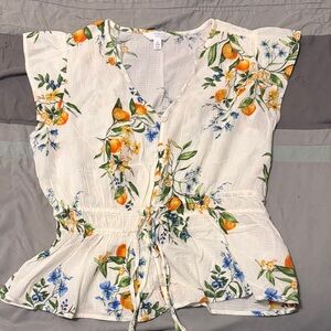 White Floral Blouse with Orange and Blue Accents